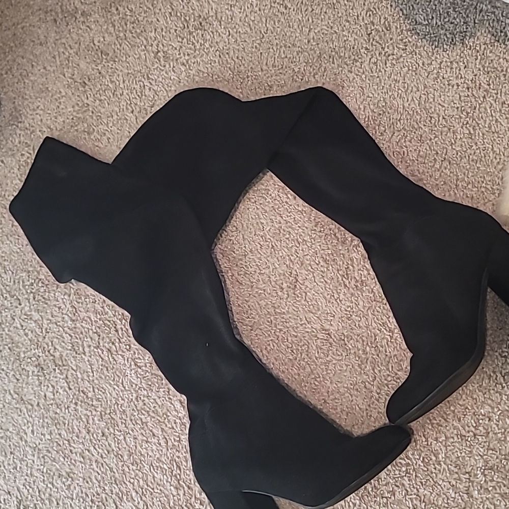 Over the knee heeled boots